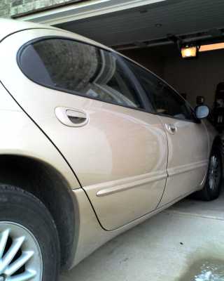 Mike's paintless repair Dodge After
